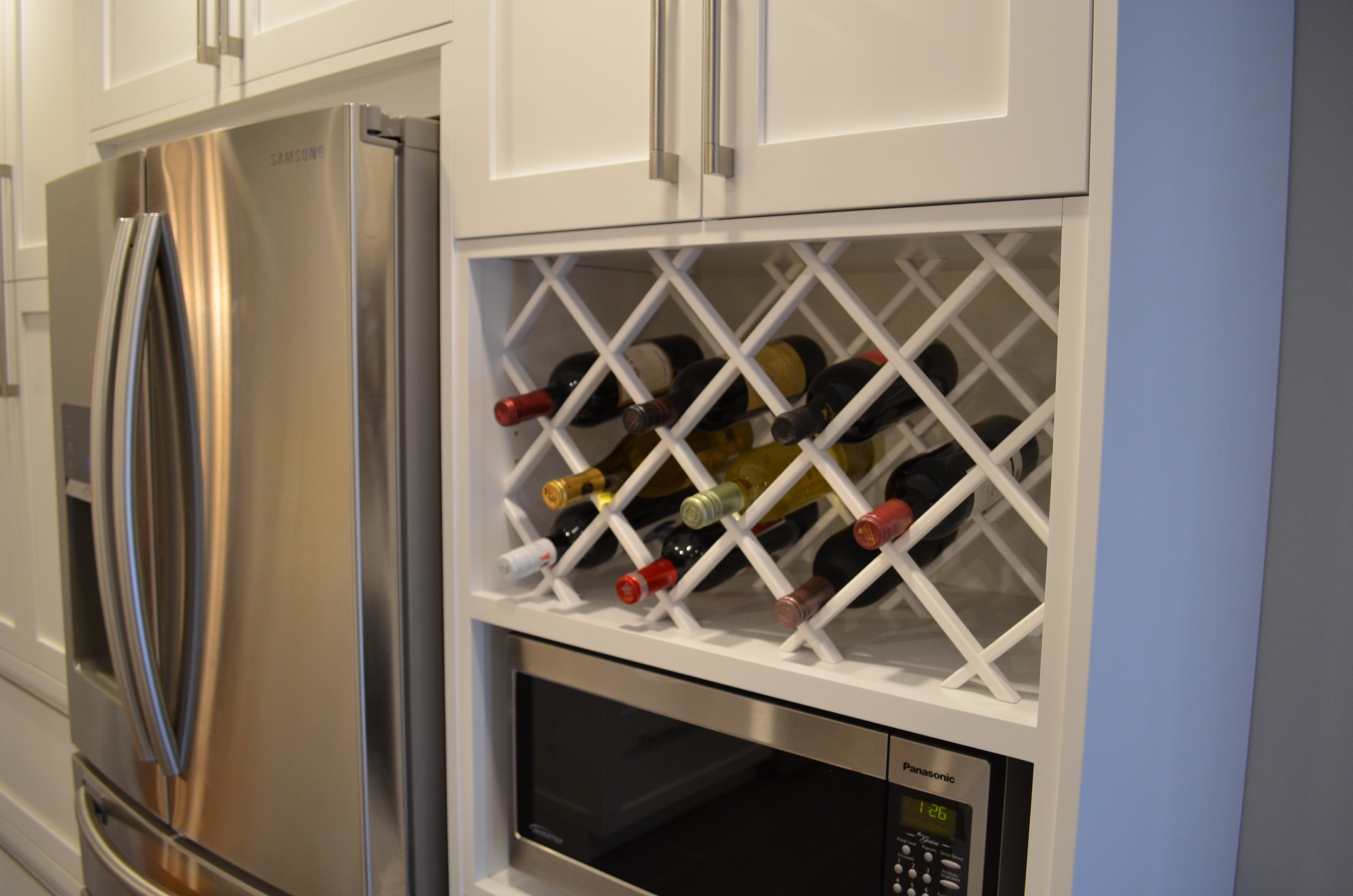 wine rack Modern kitchen renovation white cabinetry Stittsville